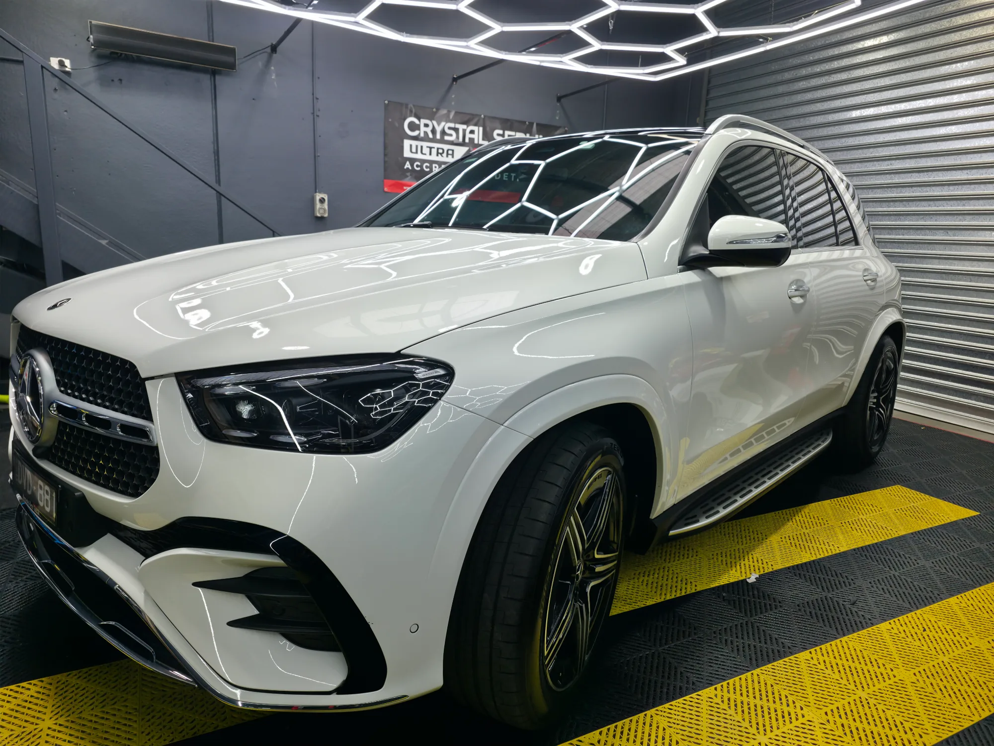 Ceramic coating finish on a white SUV at our Keysborough studio